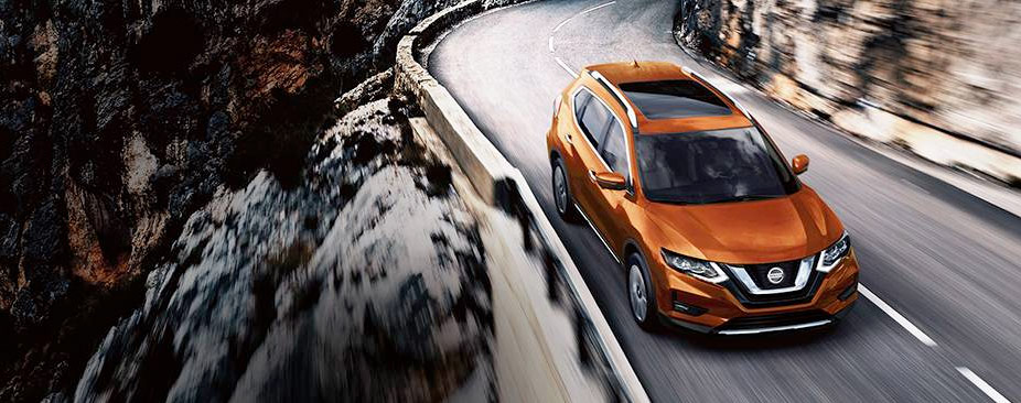 Nissan Rogue SL shown in Monarch Orange with optional equipment Nissan Rogue SL shown in Monarch Orange with optional equipment