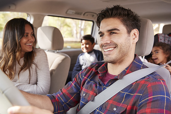 Image of family driving in vehicle