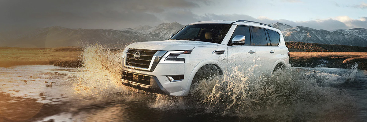 2023 Nissan Armada fording a stream.